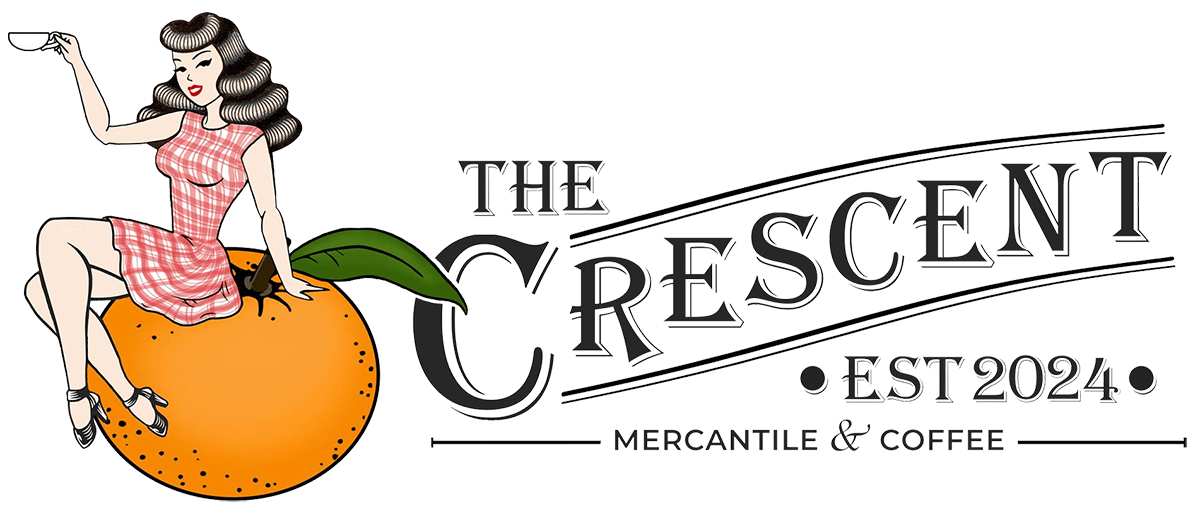 The Crescent logo with a young retro girl with black hair sitting on an orange.